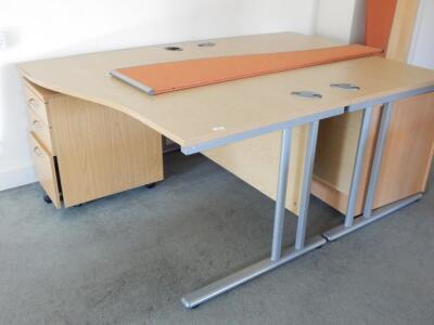 *A pair of ergonomic office desks