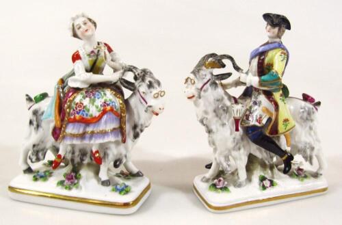 A pair of 19thC Chelsea style figures