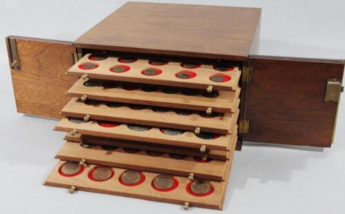 A table-top specimen coin cabinet