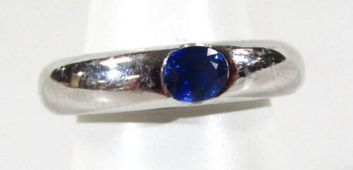 A single sapphire set dress ring