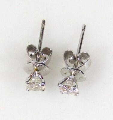 A pair of peg set single stone earrings - 2