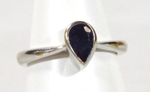 A single tanzanite set dress ring