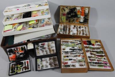 Two double side cases of tied fishing flies