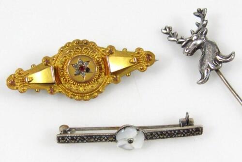 An Edwardian elipse shaped memorial brooch