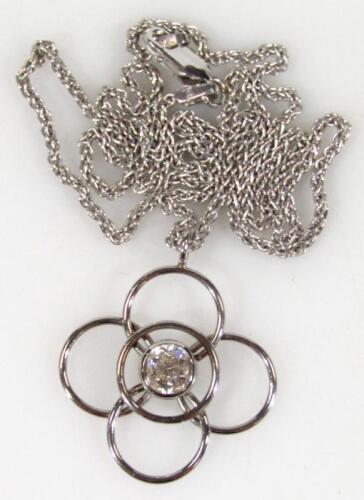 A diamond pendant and chain