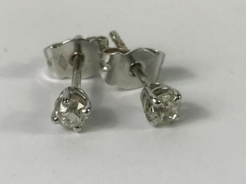 A pair of 18ct white gold diamond stud earrings