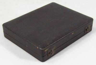 A cased George VI silver part engine turned travel set - 3