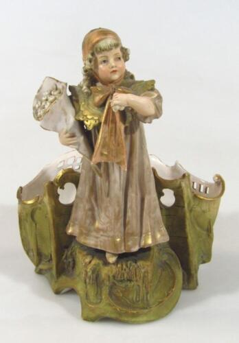 A late 19th Continental Dux style porcelain figure