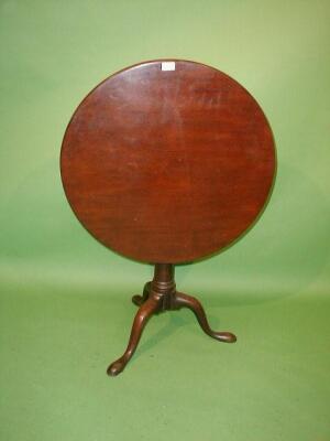 A George II mahogany supper table with circular tilt top over a bird cage