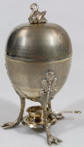 An early 20thC silver plated egg warmer