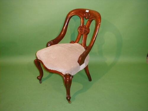 A William IV mahogany chair with down swept arms