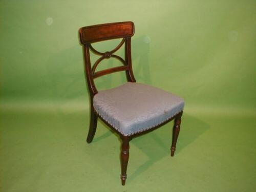 A set of seven early 19thC mahogany dining chairs