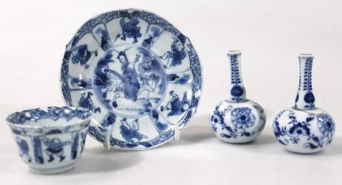 An 18thC Chinese blue and white tea bowl and saucer