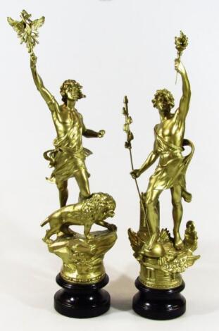 A pair of 19thC style gilt metal figures