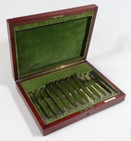 A mahogany cased canteen of cutlery