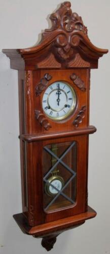 A 20thC polished Vienna style wall clock