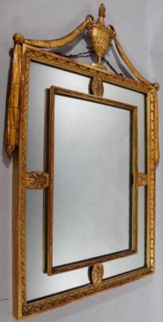 A neo-classical design wall mirror