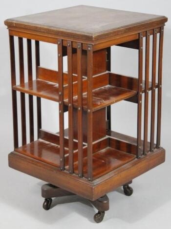 An Edwardian mahogany revolving bookcase