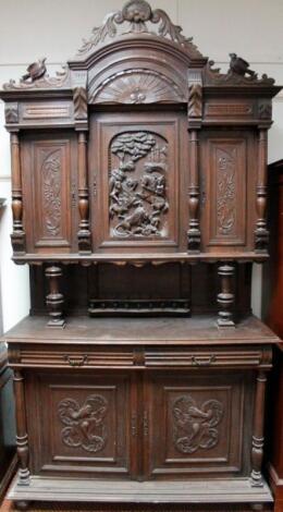 A 19thC Continental French oak chiffonier cabinet