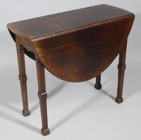 An early 19thC mahogany D-end table