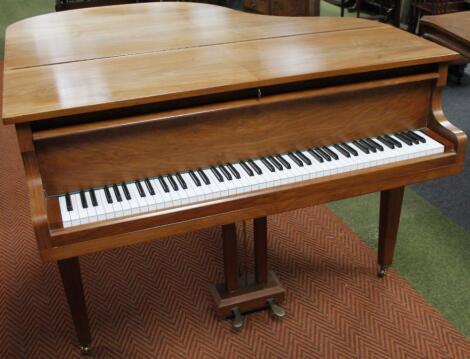 A modern walnut cased Kemble baby grand piano