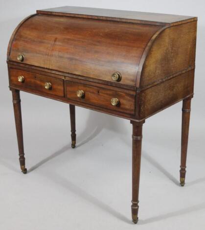 A 19thC mahogany cylinder top desk