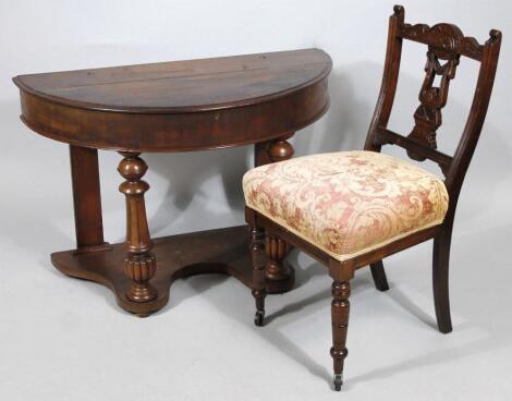 A late Victorian mahogany D-end washstand