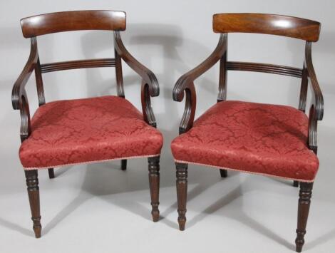 A pair of early 19thC mahogany carver chairs