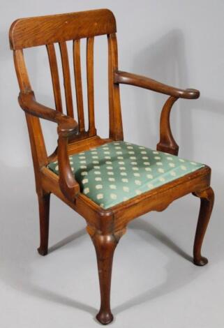 A 1920's oak carver office chair