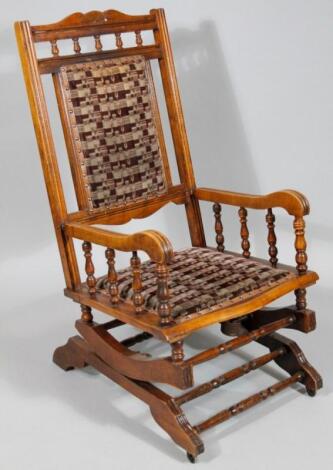 An American walnut rocking chair