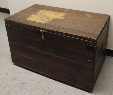 A stripped and lightly stained pine tool chest