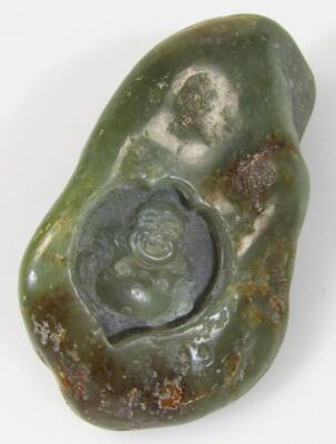 A 20thC Chinese green jade carving