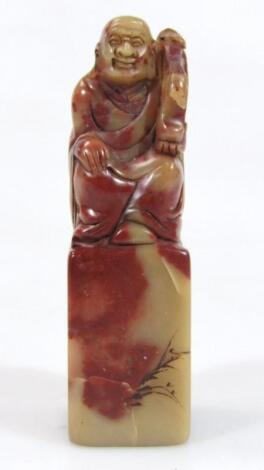 A Chinese Qing style soapstone desk seal figure