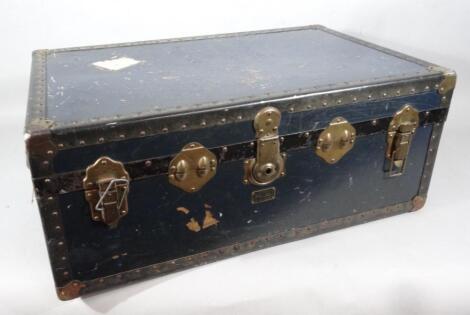 An early to mid 20thC pressed leather and metal bound sea chest