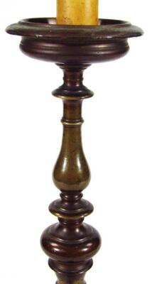 A 20thC bronze candle stand - 3