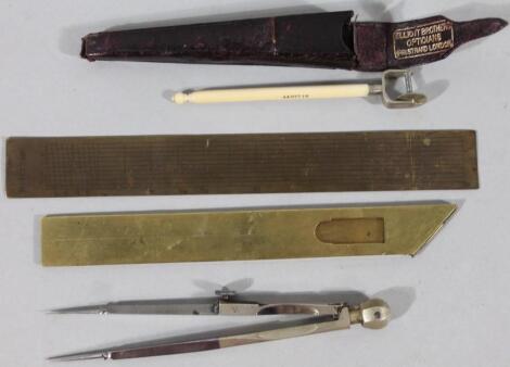 A 19thC French folding set square and brass scale rule