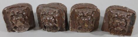 A set of four early 19thC treacle glazed stoneware blocks