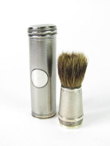 A Victorian silver cased shaving brush and cream applicant