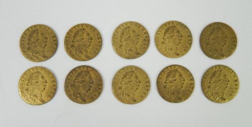 Ten George III spade guinea gaming tokens