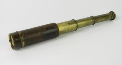 A Victorian brass and leather bound six draw telescope, 52cm long extended.