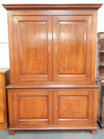 A George III style oak linen press