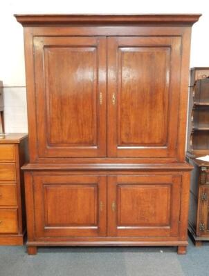 A George III style oak linen press - 2