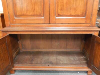 A George III style oak linen press - 3