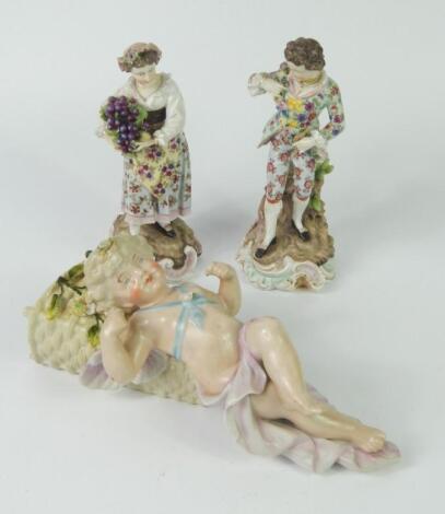 A pair of Sitzendorf late 19thC porcelain figures