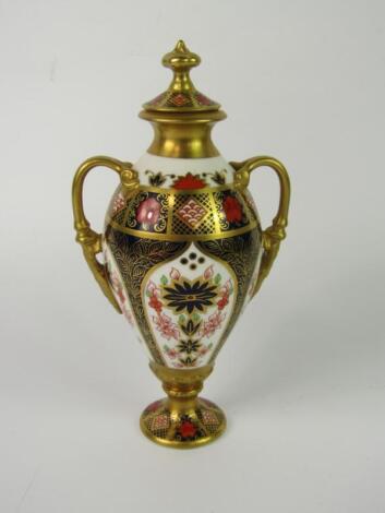 A Royal Crown Derby porcelain vase and cover