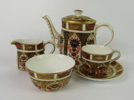 A Royal Crown Derby porcelain miniature solitaire tea set
