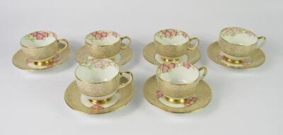 A set of six Paragon porcelain coffee cups and saucers