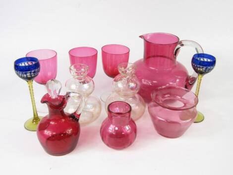 A group of cranberry glass