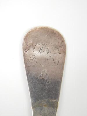 A Continental white metal spoon with floral engraved handle - 3
