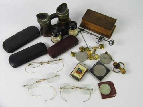 Three pairs of yellow metal rimmed spectacles